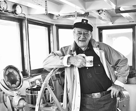  JOHN WAYNE ABOARD HIS YACHT WILD GOOSE